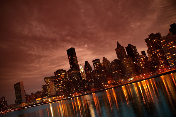 http://www.hdwallpapers.in/manhattan_nyc_reflections-wallpapers.html