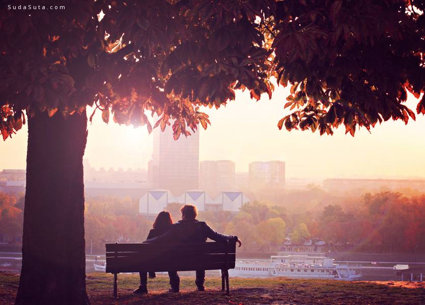 Romantic couple in autumn dawn
