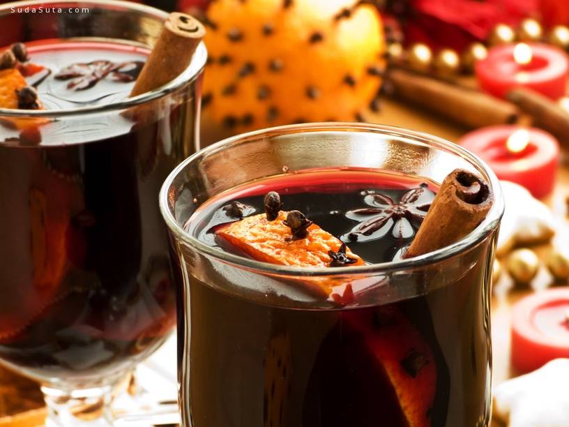 Mulled wine with slice of orange and spices. Shallow dof.