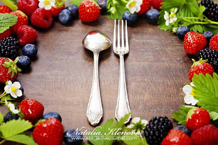 fresh berries on wooden background